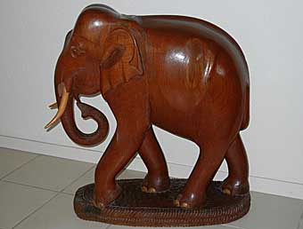 Carved teak elephant
